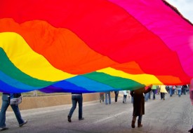 Building a Bridge Between LGBT Groups and Communities of Color rainbow flag