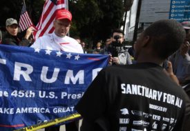 Navigating the Pro-Democracy and Antiracist Struggle Ahead Pro-Trump supporters, left, argue with demonstrators after a Feb. 18 march in Los Angeles to protest the president's immigration policies. Sociologists say President Trump's actions and rhetoric are politically energizing both conservatives and liberals.
Mark Ralston/AFP/Getty Images